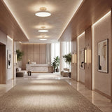 UMAGE_lifestyle_Asteria Up Plus_ mini_pearl white_Lemon Squeeze_wall lamp_long_single_brass.jpeg